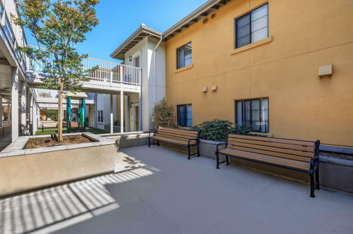 MacArthur Apartments courtyard and benches