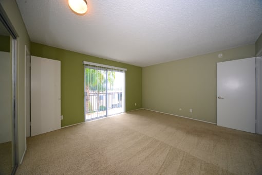 Ocean View Townhomes unfurnished living space and patio