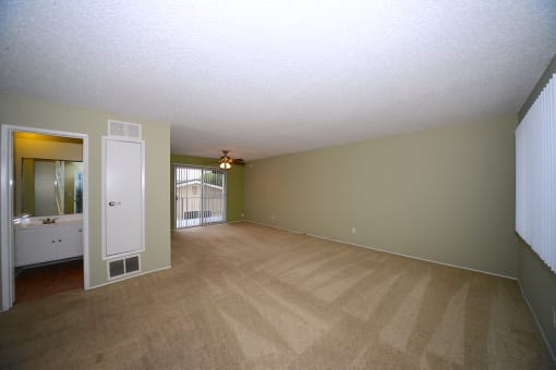 Ocean View Townhomes unfurnished living space with patio and ceiling fan