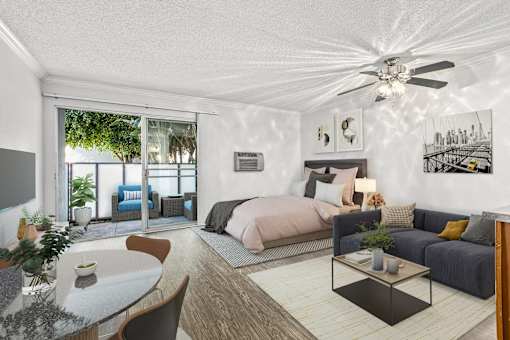 A modern bedroom with a large bed and a balcony.