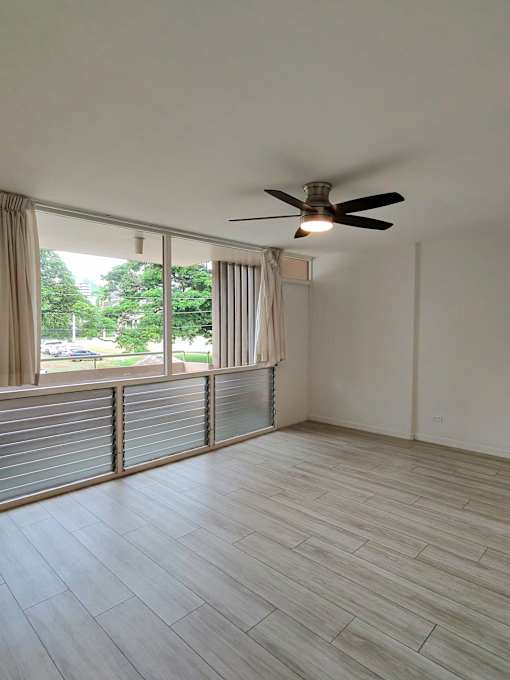 Punahou Circle living room with a ceiling fan.