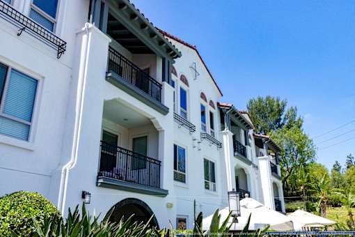 Horizons at Calabasas building with balconies and a red roof.