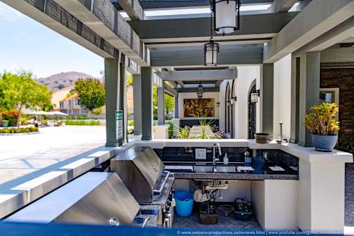 Horizons at Calabasas BBQ area with grills, a sink and a counter.