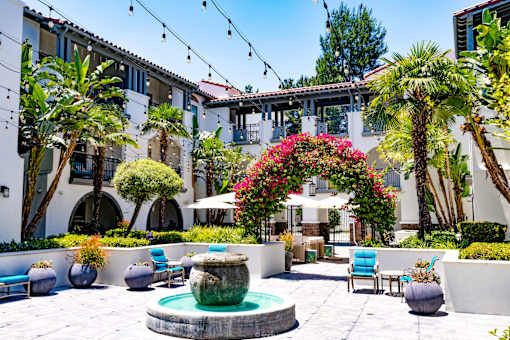 Horizons at Calabasas courtyard with a fountain and chairs.