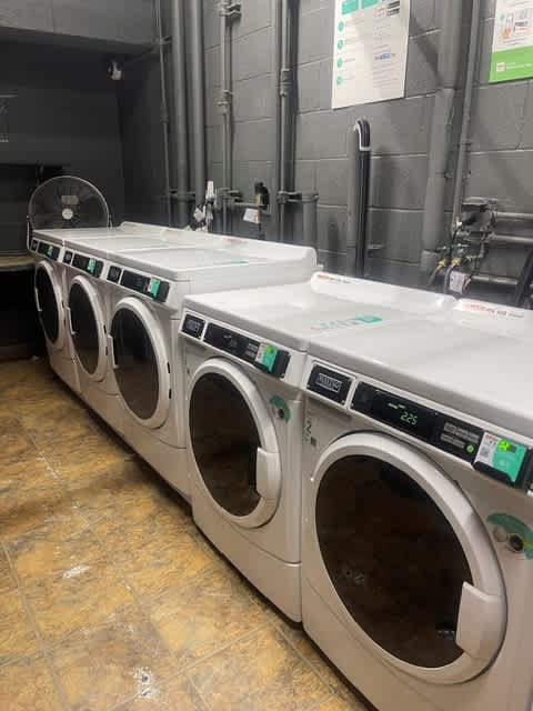 Seaview laundry room with a row of washing machines .