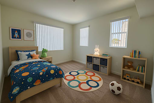 A bedroom with a bed, a rug, a soccer ball, and a bookcase.
