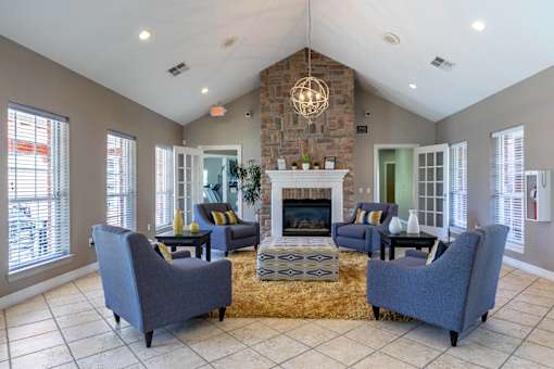 A living room with a fireplace and a couch.