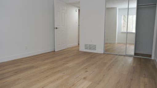 The Canyon at Sherman Oaks Unit 05 bedroom with flooring