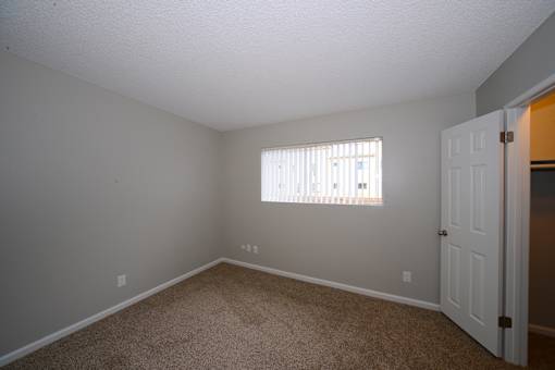 University Gardens unfurnished bedroom with window