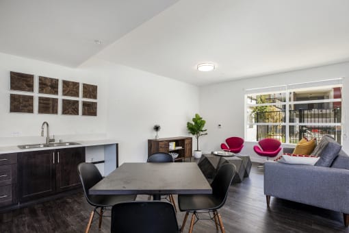 YOLO East dining room table and furnished living room