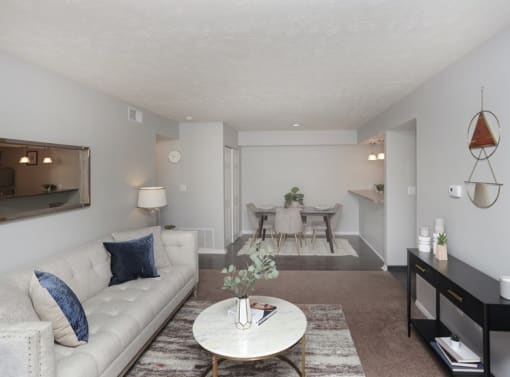 a living room with a couch and a coffee table