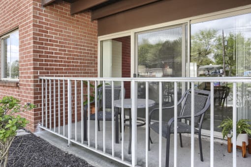 Harrisburg Apartment | Twin Lakes Apartments | a balcony with two chairs and a table