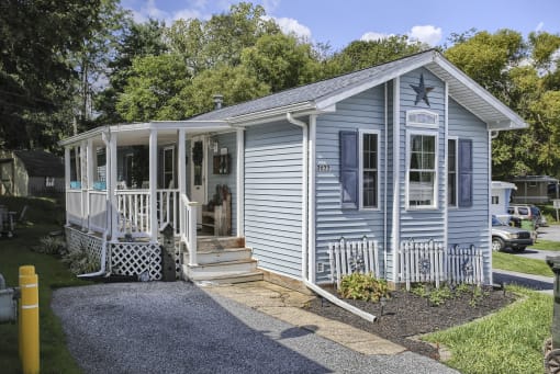 a blue house with a star on the front