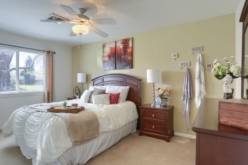 Harrisburg Apartment | Twin Lakes Apartments | a bedroom with a large bed and a dresser