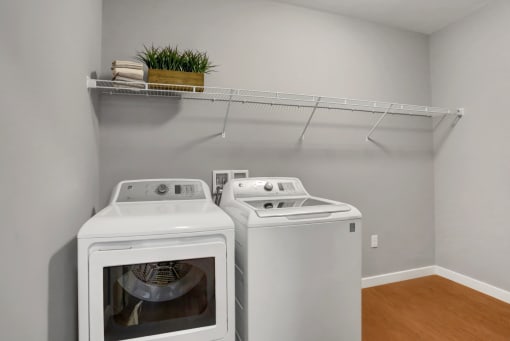 a washer and dryer in a laundry room | Centerpointe Apartments in Camp Hill