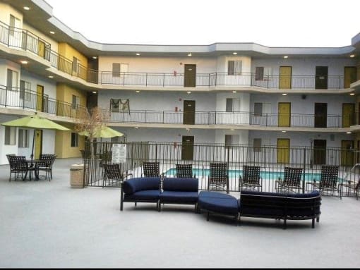 Beautiful outdoor area vassar terrace with pool and lounge seating