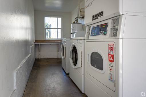 A laundry room with a washer and dryer.