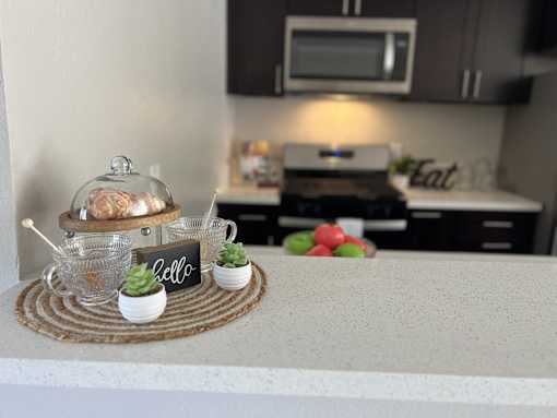 a kitchen counter with a tray with food on it