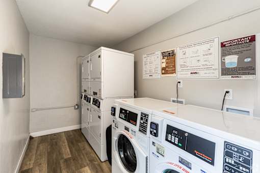 A laundry room with a washer and dryer.