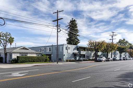 A street view with a house named "Laurel" on the left.