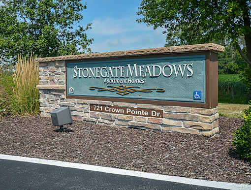 Stone gate meadows apartment homes sign.