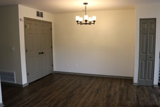 Room with wooden floor at The Westcott, Evansville, 47715