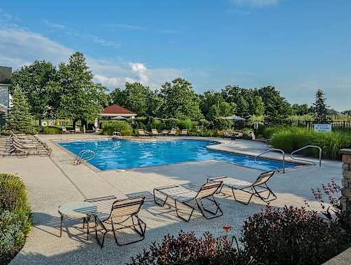 Pool surrounded by chairs at The Marlowe, Indiana, 46804