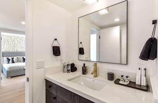 a bathroom with a sink and a mirror at 8535 Colgate-Fully Furnished Apartments, Los Angeles, CA, 90048