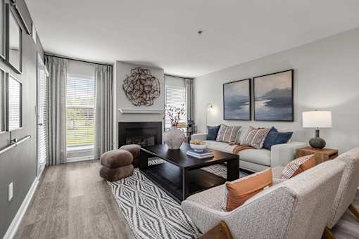 A living room with a fireplace and a couch.