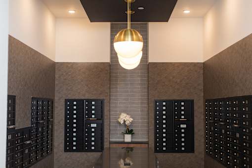 A modern interior with a chandelier hanging from the ceiling.