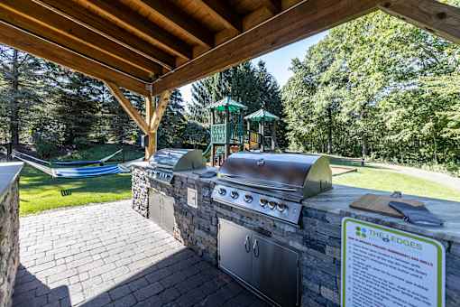 A grill area with a sign that says The Edges.