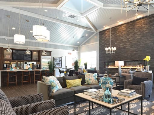Cross keys clubhouse with seating, a bar and fireplace  at Barclay Glen Apartments, Williamstown
