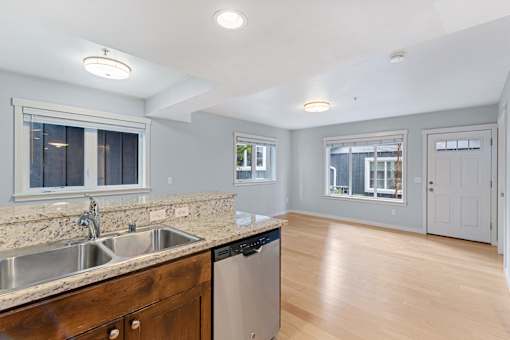 the kitchen and living room are spacious and open to the living room