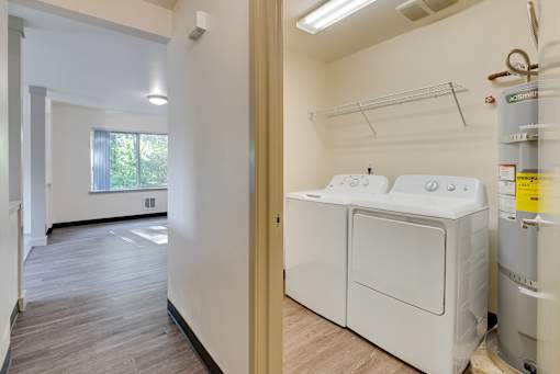 A laundry room with a washer and dryer.