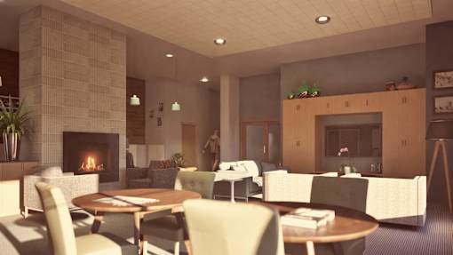 a living room with tables and chairs and a fireplace