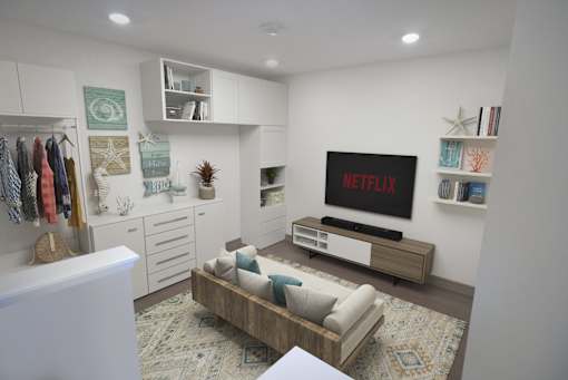 A living room with a Netflix sign on the TV.