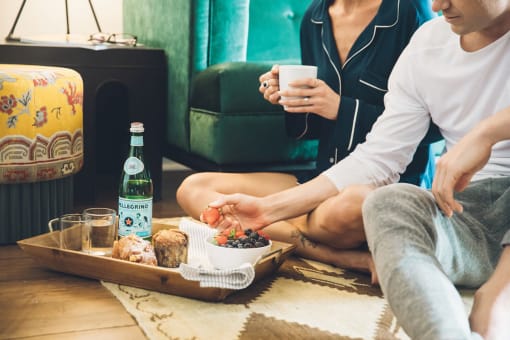 Couple Eating Breakfast at Villa Carlotta – Furnished Apartments, California, 90028