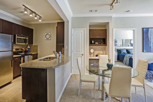 furnished kitchen and dining area in apartment home  at The Brookhaven Collection, Atlanta, GA, 30329