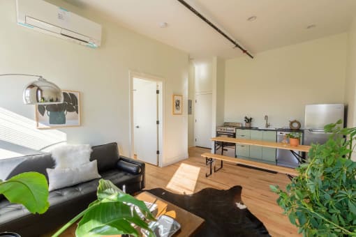 a living room with a couch and a table