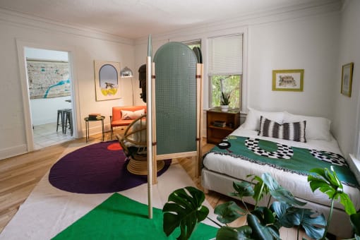 a bedroom with a bed and a surfboard