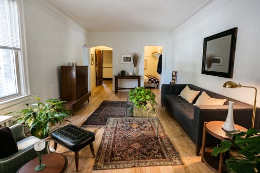 a living room with a couch and a table