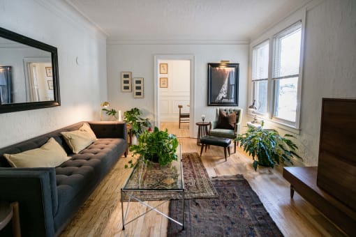 a living room with a couch and a table