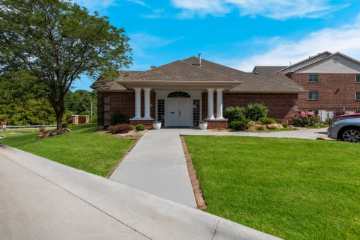 a house with a car parked in front of it at Valley View Estates, Council Bluffs, 51503