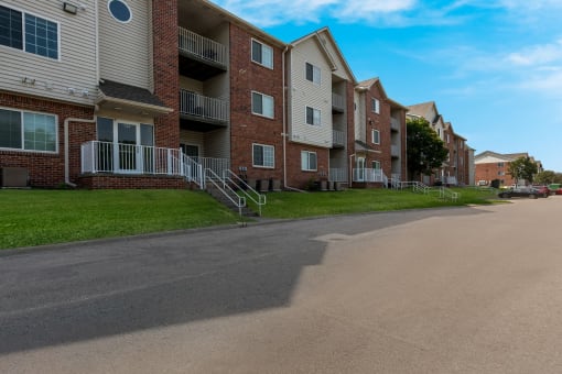 a view of the exterior of a building at the whispering winds apartments at Valley View Estates, Council Bluffs