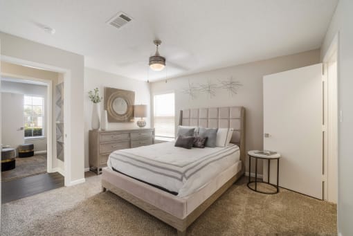 Bedroom area with bed and window at The Luxe of Southaven, Southaven, Mississippi