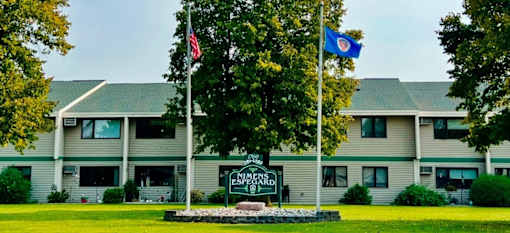 A building with a sign that says "Northern Essex" in front of it.