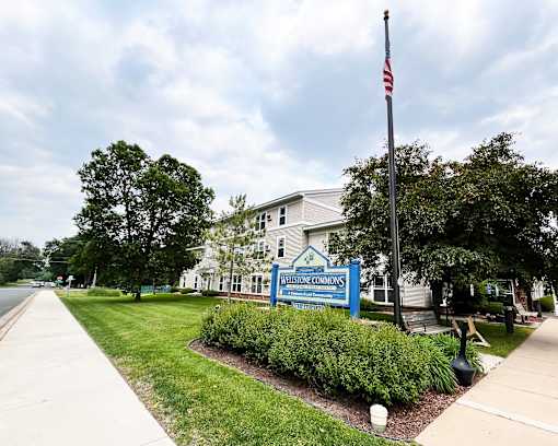 A building with a sign that says Westminster Commons.