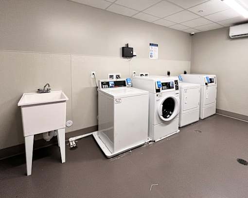 A laundry room with a washer and dryer.