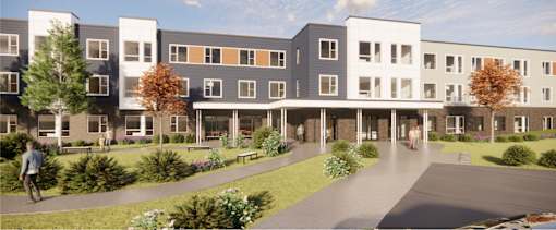 A modern apartment complex with a walkway in front.