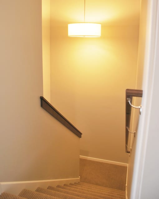 a view of the stairway from the living room